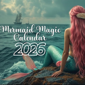 May include: A mermaid with long pink hair and a teal tail sits on a rock near the ocean. The text "Mermaid Magic Calendar 2026" is displayed in white script. A sailboat is visible in the background.