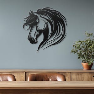 May include: Black metal wall art featuring a horse's head with flowing mane. The horse is facing left and has a detailed design.