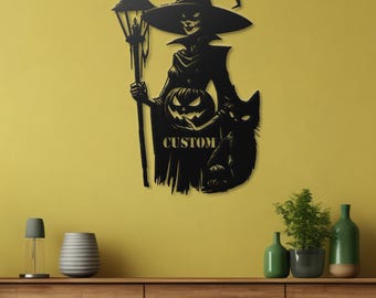 May include: Black metal wall art featuring a witch holding a lantern and a black cat. The witch is wearing a pointed hat and a long robe. The word "CUSTOM" is written on the wall art.