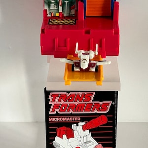 Vintage Caserne de pompiers Autobot Transformers avec base 5 Micromaster Hot House G1 complète avec carte de statistiques et instructions Hasbro