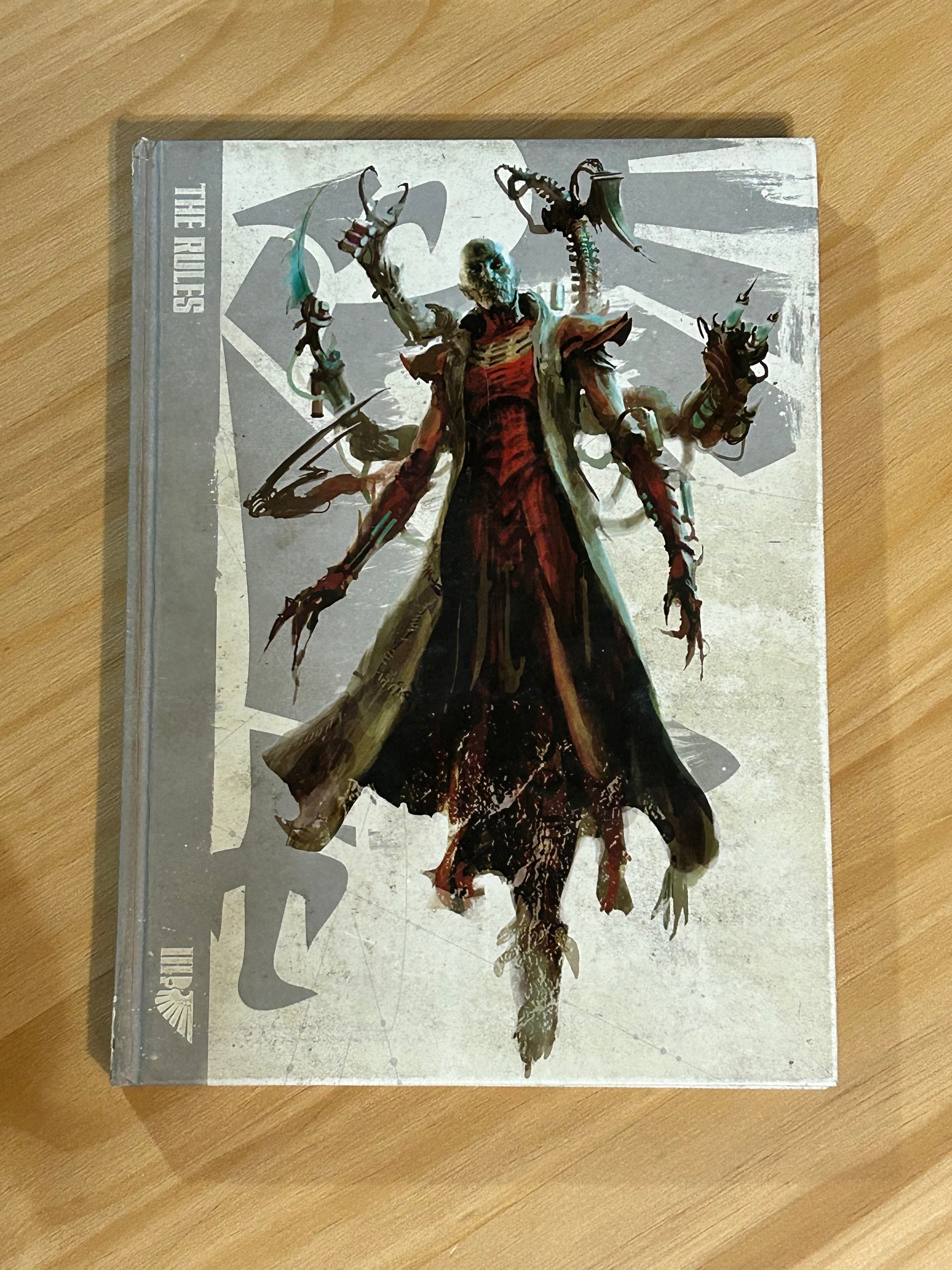 Warhammer 40,000 (The Rules, A Galaxy of War, Dark Millennium) par Games Workshop, Inc.: Fine Hardcover (2014) 1st Edition | The Archives