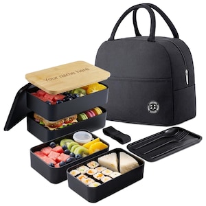 May include: A black lunch bag and bento box set. The bento box has a wooden lid with the text "Your name here". The set includes a black bag, containers, utensils, and a strap. The containers are filled with food.