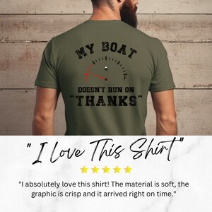May include: Green t-shirt with a black graphic of a fuel gauge that reads "MY BOAT DOESN'T RUN ON THANKS".