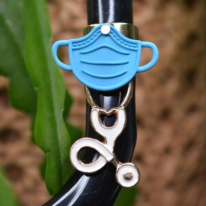 Medical Mask & Stethoscope Charm – Rotatable, Secure, and Stylish!