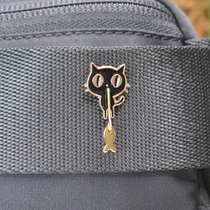 Cute Cat Enamel Pin with Dangling Fish | Cute Black Cat Pin for Backpacks, Jackets, Hats & Gifts