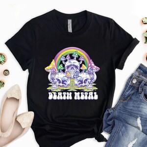 May include: Black t-shirt with a graphic of a rainbow, mushrooms, and skulls. The text "Death Metal" is printed below the graphic.