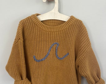 embroidered beach wave knit sweater