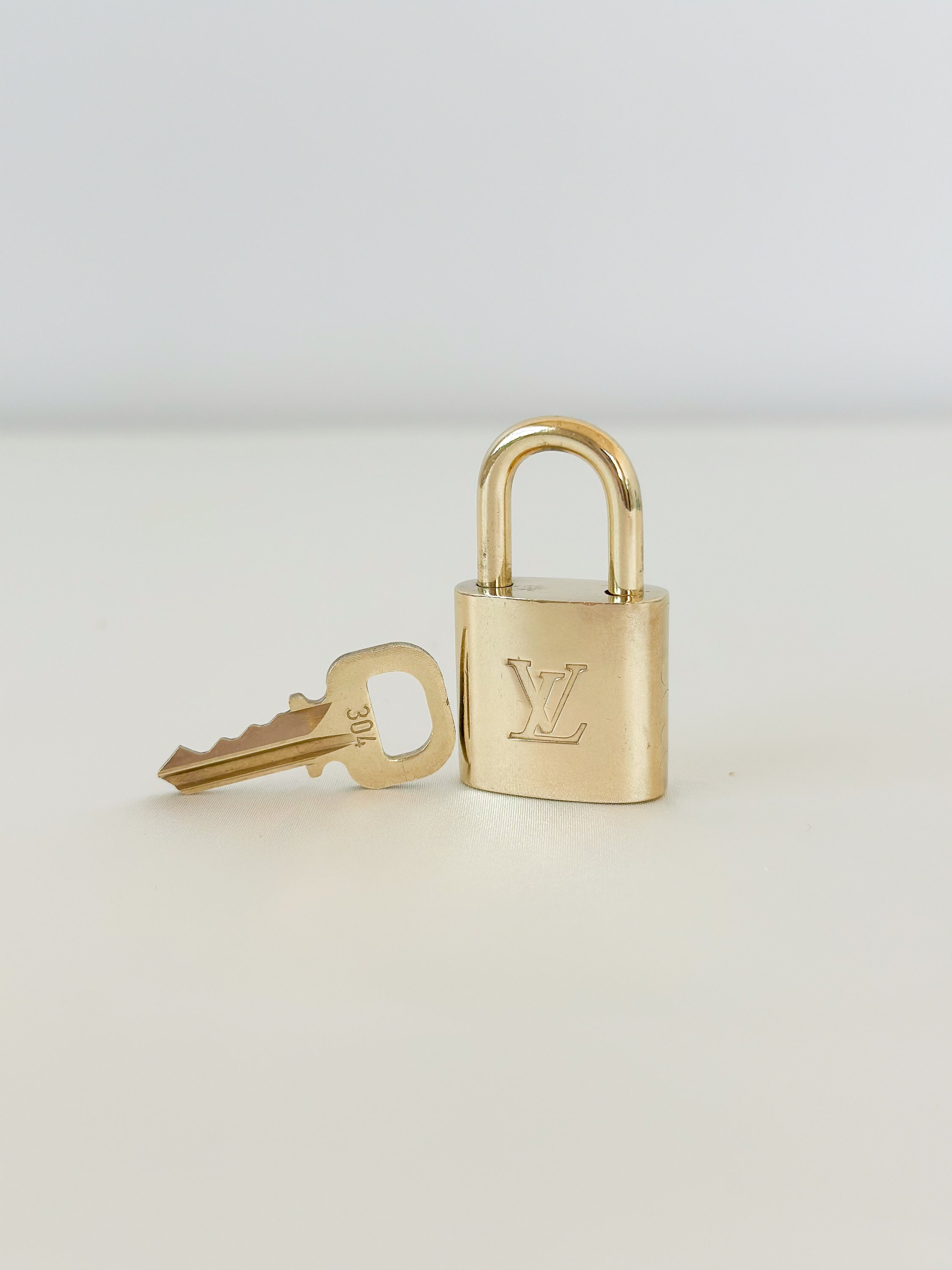 Louis Vuitton Padlock set Lock & Key with storage bag 314, Luxury