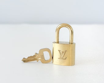 Louis Vuitton, Bags, Lv Vintage Lock Key 446