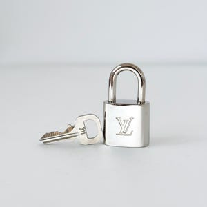 Louis Vuitton Silver Padlock 311