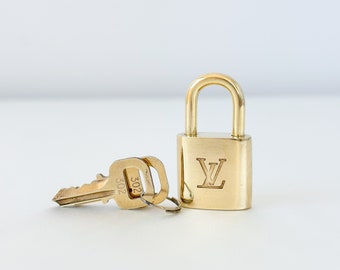 Louis Vuitton, Bags, Lv Gold Lock Key 322