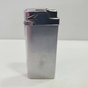 Vintage Working Advertising Silver PENGUIN Lighter &quot;SEABOARD WORLD&quot; 4517/34