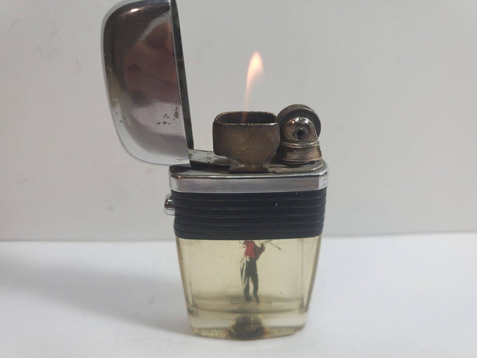 WORKING VINTAGE Scripto Vu Lighter Golfer & Black Band 5928