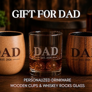three personalized drinkware items, including wooden cups and whiskey rocks glasses, with the text "Gift for Dad" displayed above them.