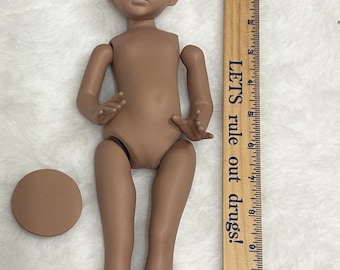 Vintage Handmade unpainted 12 inch bisque porcelain doll kit for “Nicole”, mold by Dianna Effner poured in Cinnamon Porcelain