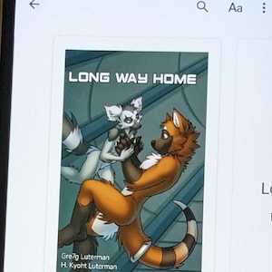 May include: A smartphone displays an ebook cover titled "LONG WAY HOME." The cover art features two anthropomorphic foxes in a dynamic pose. The phone is black and rests on a wooden surface.