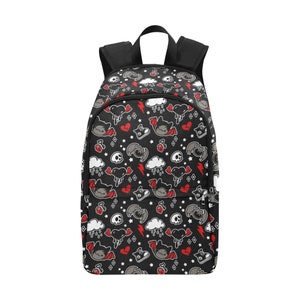 May include: Black backpack with a repeating pattern of cartoon bats, hearts, skulls, clouds, and lightning bolts in red, white, and gray. The backpack has black shoulder straps and a top handle.