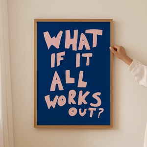 May include: A framed print with a blue background and pink text that reads "What if it all works out?"