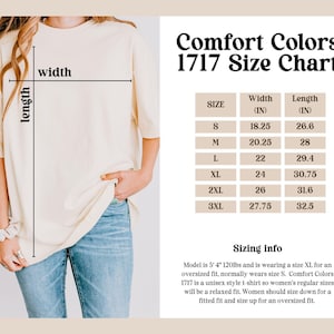 May include: Cream-colored Comfort Colors 1717 t-shirt with a size chart. The chart lists shirt sizes S-3XL with width and length measurements in inches. The model is wearing an XL for an oversized fit.