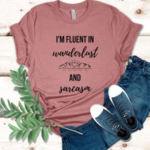 I&#39;m Fluent in Wanderlust and Sarcasm shirt, travel shirt, funny shirt, vacation shirt, nomad life, holiday gift, road trip, nomad shirt