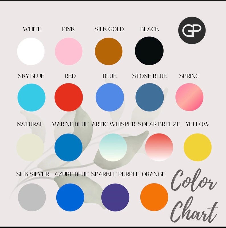 May include: A color chart featuring a variety of colors, including white, pink, red, blue, and yellow. Each color is displayed in a circular shape with its name written above. The words "Color Chart" are written in cursive.
