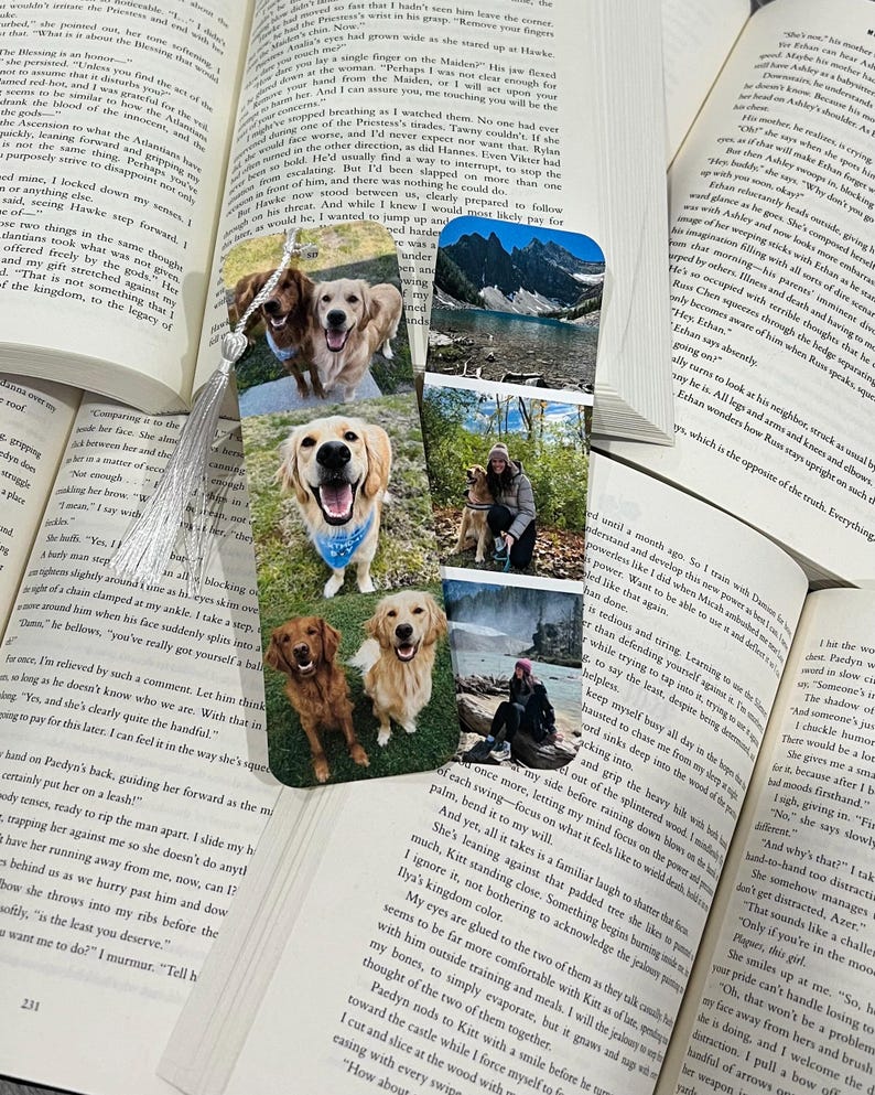 May include: Two photo bookmarks feature adorable golden retrievers in various settings.  The top bookmark showcases two dogs, one light and one darker gold, sitting together. The bottom bookmark displays a single golden retriever, a smaller reddish-brown dog, and a person with a golden retriever.  All images are vibrant and well-lit, showcasing the dogs' playful expressions. The bookmarks are a practical and sentimental gift for dog lovers.