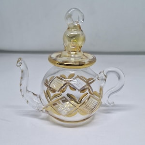 English teapot. Egyptian hand-blown glass Christmas ornaments decorative by 14k gold, (Golden patterns maybe different always changing )