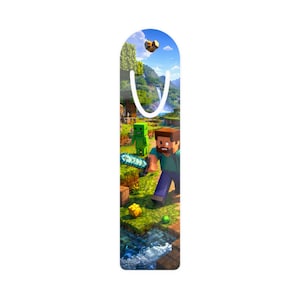 May include: A Minecraft bookmark with a colourful design. It features the characters Steve and a Creeper in a landscape with a waterfall and pixelated elements. The bookmark has a white loop at the top.