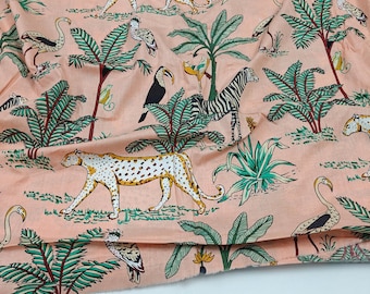 Tkanina bawełniana z nadrukiem zwierzęcym w kolorze brzoskwiniowym: materiał do szycia w stylu dżungli