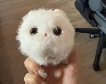 Peluche de gato giratorio y volteable: muñeco de gatito rodante suave, llavero y juguete antiestrés para amantes de los gatos.