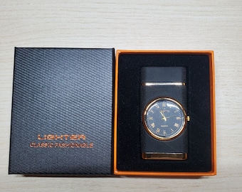 Cigarette Lighter Torch/Clock Quartz Light up Clock-Black- Light new in box!