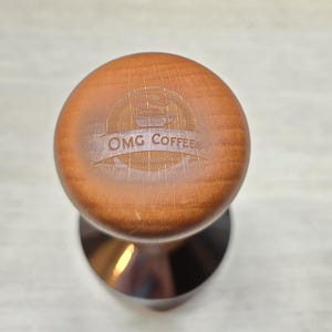 OMG Coffee 54mm Tamper – wooden handle, stainless steel base. Espresso, coffee accessories, barista tool for home brewing & coffee lovers.