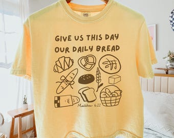 Camiseta cristiana holgada "Danos hoy nuestro pan de cada día" Camiseta con versículo bíblico de Mateo 6:11 Camiseta de pan de masa madre Regalo para panaderos de masa madre