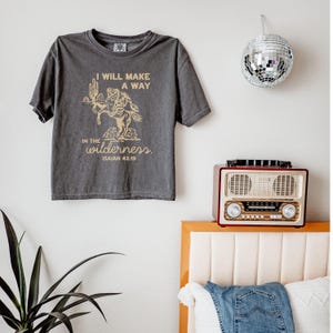 Vintage Cowgirl Shirt Western Faith Apparel Christian Graphic Tee Isaiah Scripture Design Boxy Fit Relaxed Style Ranch Country Clothing Inspirational Religious Message Wilderness Bible Verse Soft Comfortable Fabric Casual Everyday Wear