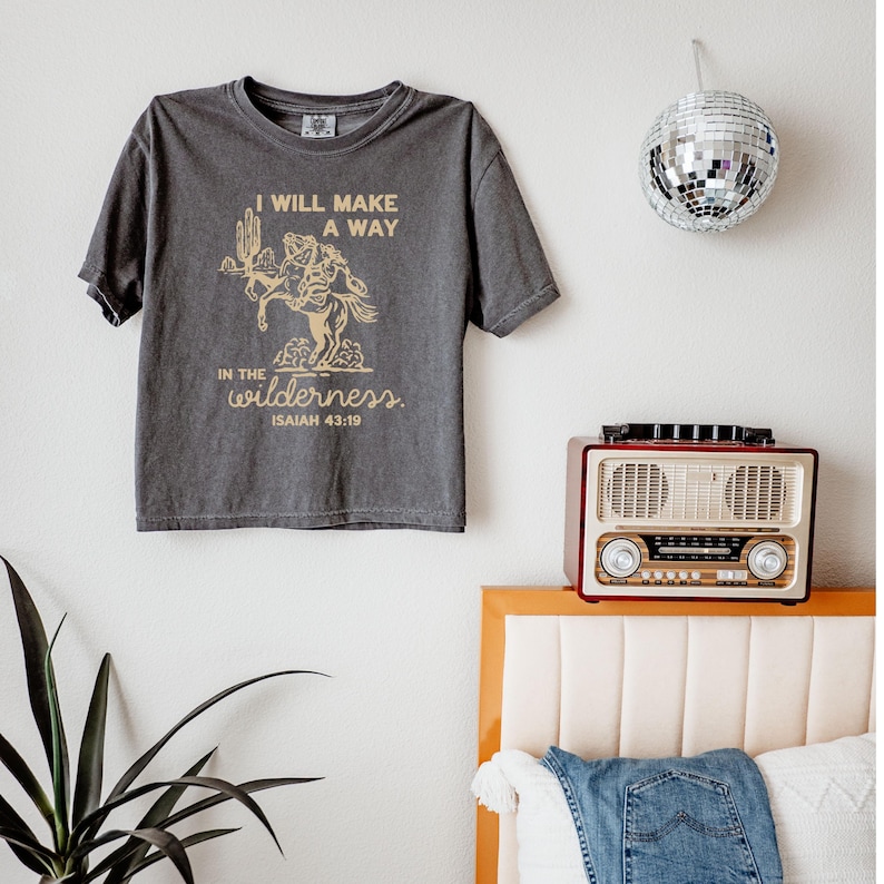 Vintage Cowgirl Shirt Western Faith Apparel Christian Graphic Tee Isaiah Scripture Design Boxy Fit Relaxed Style Ranch Country Clothing Inspirational Religious Message Wilderness Bible Verse Soft Comfortable Fabric Casual Everyday Wear