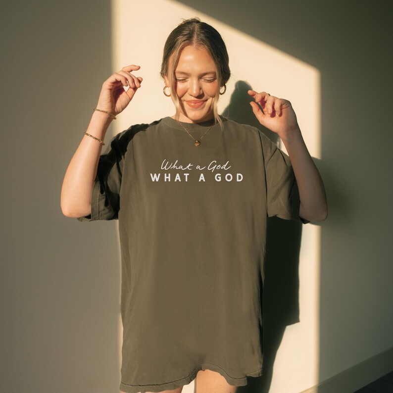 Oversized Christian Tshirt Women Faith Based Praise Team Apparel Church Outfit Sunday Service What a God Inspirational Design Worship Shirt Comfort Colors Premium Quality Soft Washed Garment Dyed Relaxed Fit Vintage Feel Neutral Tones