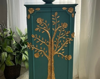 Beautiful magnolia tree jewelry armoire. Free shipping