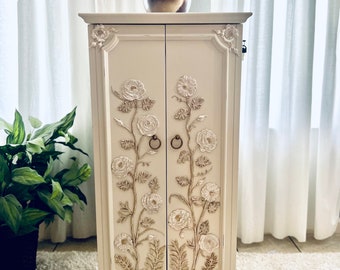 Jewelry Armoire. Shipping included.