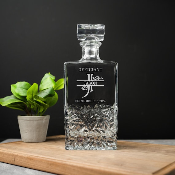 A laser-engraved glass decanter doubles as a heartfelt officiant proposal — a niche gift niche nobody else is solving this elegantly.