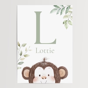 May include: A light green and white nursery art print featuring a cartoon monkey peeking from the bottom. The letter "L" and the name "Lottie" are in light green. Watercolor leaves are in the corners.