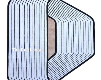 Designer handtuftad matta tillverkad av nyzeeländsk ull. Mattkonst är en handgjord vävteknik. soho matta minimalistisk matta designer matta läppar matta