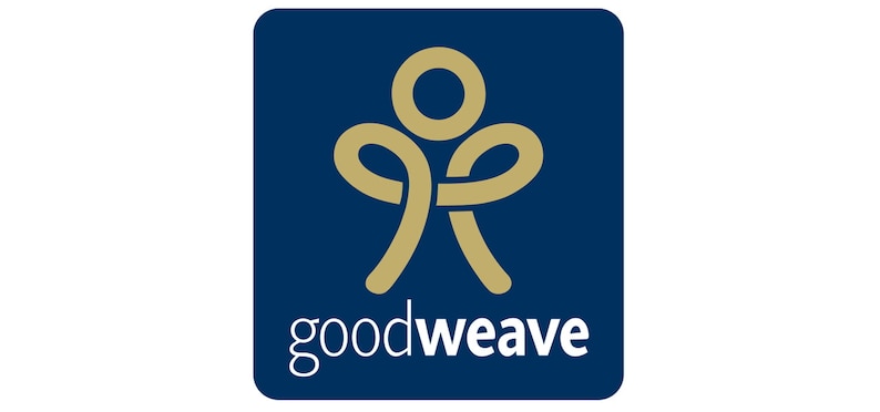 May include: A dark blue square featuring the GoodWeave logo. The logo depicts a gold-coloured abstract figure above the white text 'goodweave'. The figure resembles a person with arms raised.