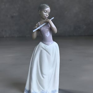 Nao by Lladro 02001339 Notes On The Wind Figurine