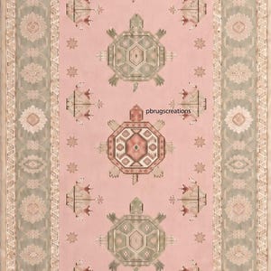 May include: A rectangular area rug featuring a soft pink center field with a repeating pattern of stylized turtles in alternating shades of sage green and dusty rose. The rug has a wide sage green border with geometric floral motifs and fringe.