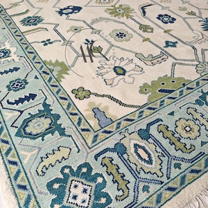 Hand-Knotted Cream Oushak Rug: 8x10 Wool Floral Area Rug