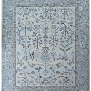Alfombra Oushak hecha a mano de 23 x 36 cm: diseño moderno en crema, azul y beige