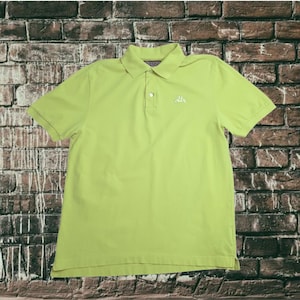 Geel Kappa-poloshirt uit de jaren 2000. Medium. True Vintage, Noughties, T-Shirt, T-shirt, Streetwear, Sportswear, Tweedehands, Preloved, Duurzaam