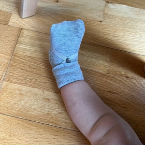 Schlingel Sockenhalter für Babys mit Applikation Bild 8