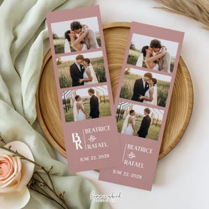 May include: Two dusty rose wedding photo bookmarks with three images of a couple. The bookmarks have the names "Beatrice & Rafael" and the date "June 22, 2028" printed on them. The bookmarks are on a wooden tray.