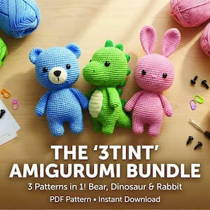 May include: A collection of three crocheted amigurumi toys: a blue bear, a green dinosaur, and a pink rabbit. The toys are displayed with colorful yarn balls, crochet accessories, and the text "THE '3TINT' AMIGURUMI BUNDLE".
